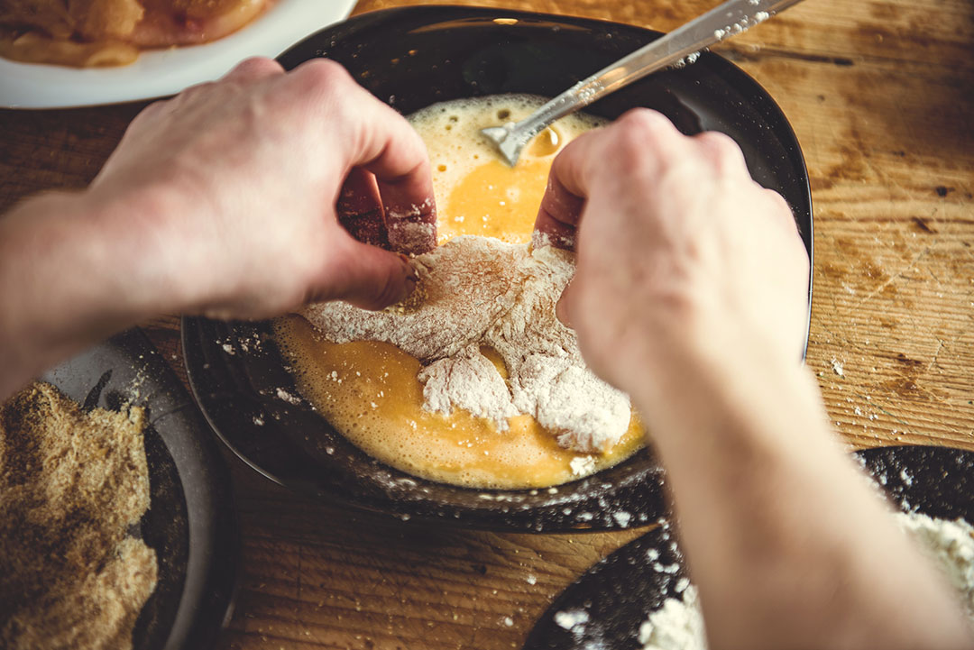 dipping chicken in buttermilk